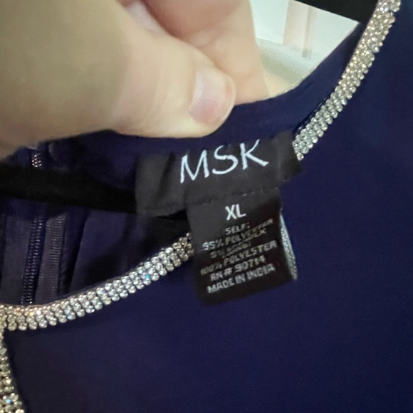 Elegant Blue Jumpsuit with Embellished Neckline - Picture 6 of 6